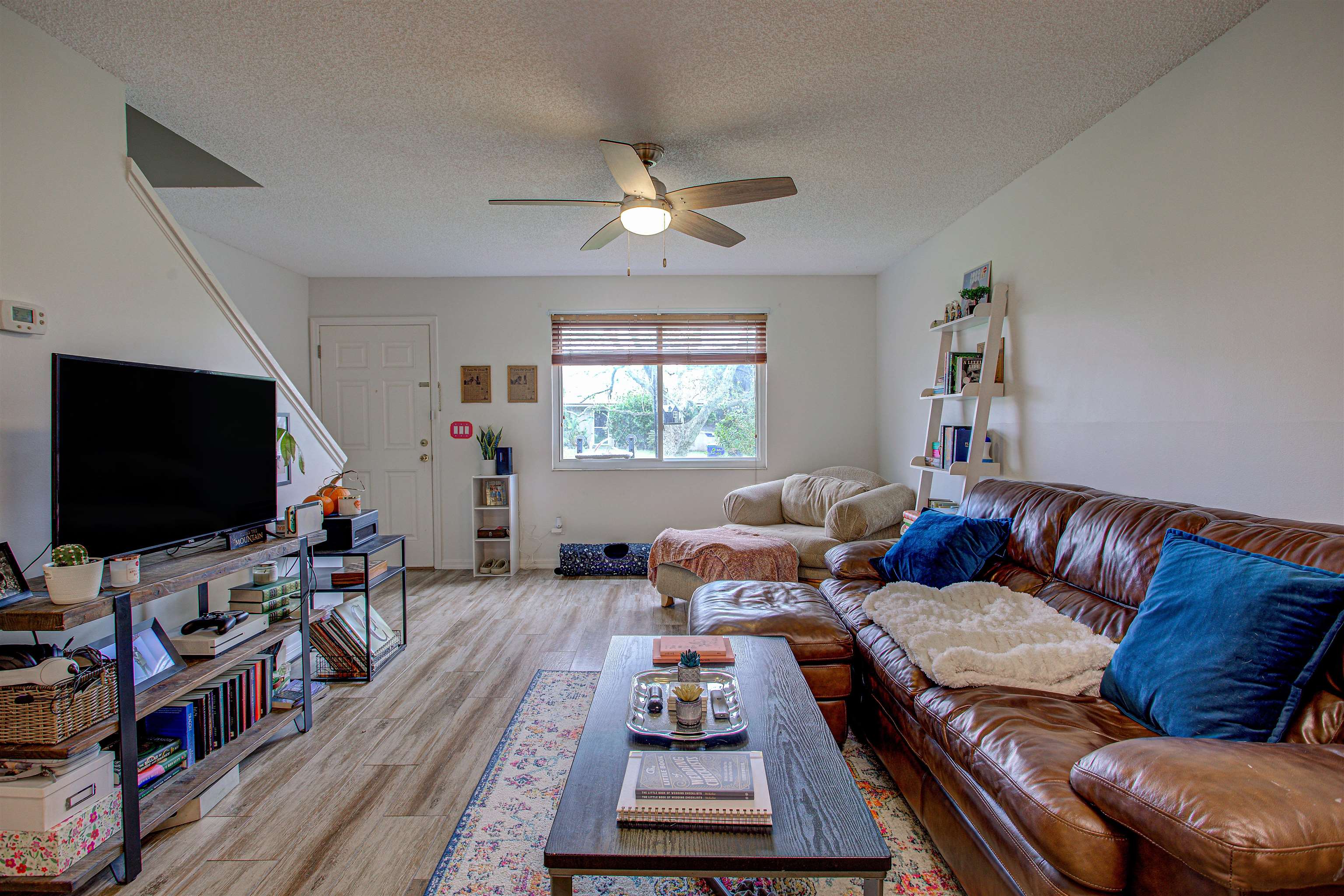 118 Rio Del Mar Street St. Augustine, FL 32080 - Photo 9 of 24 a living room with furniture and a flat screen tv