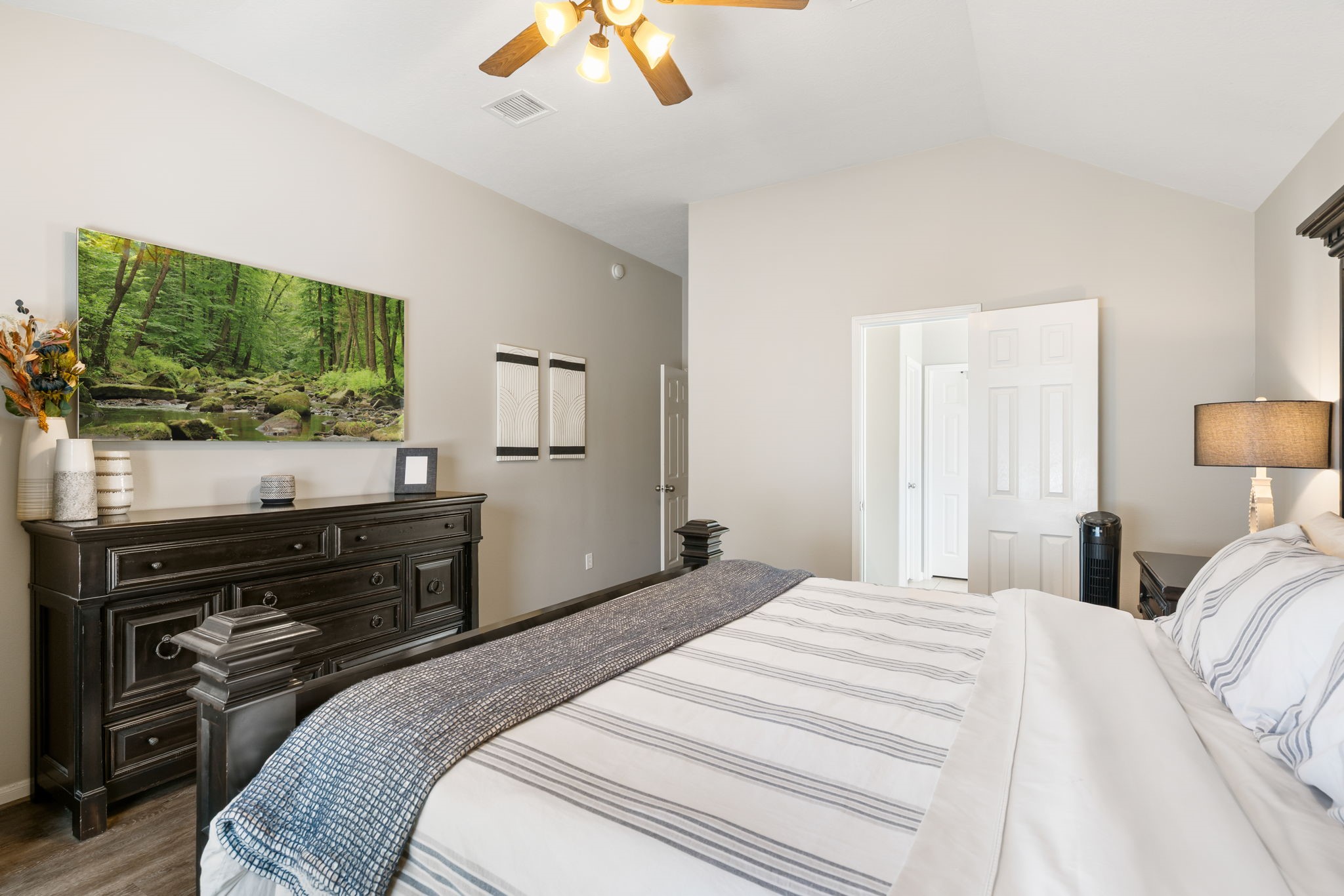 20903 Manon Lane Spring, TX 77388 - Photo 19 of 31 a bedroom with a bed and a flat screen tv