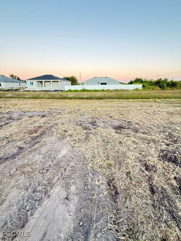 1102 Adeline Avenue Lehigh Acres, FL 33971 - Photo 5 of 9 a view of an ocean and beach