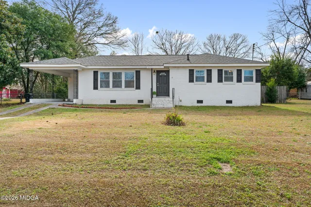 a view of a house with a swimming pool