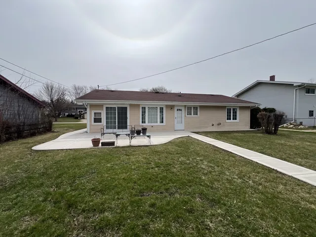 a front view of a house with swimming pool