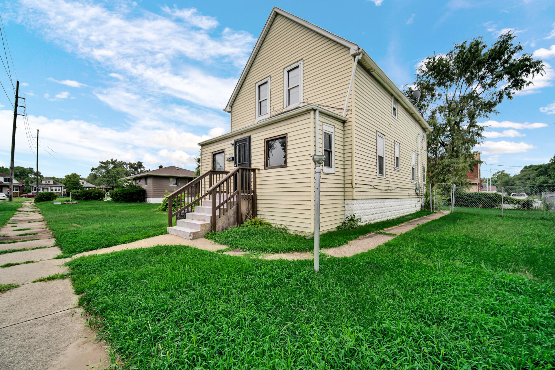 1356 Johnson Street Gary, IN 46407 - Photo 2 of 12 a view of a house with backyard