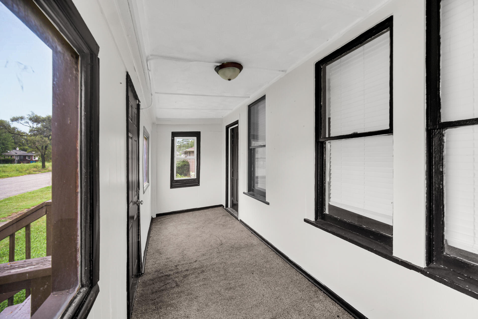 1356 Johnson Street Gary, IN 46407 - Photo 3 of 12 a view of a hallway with windows and entryway