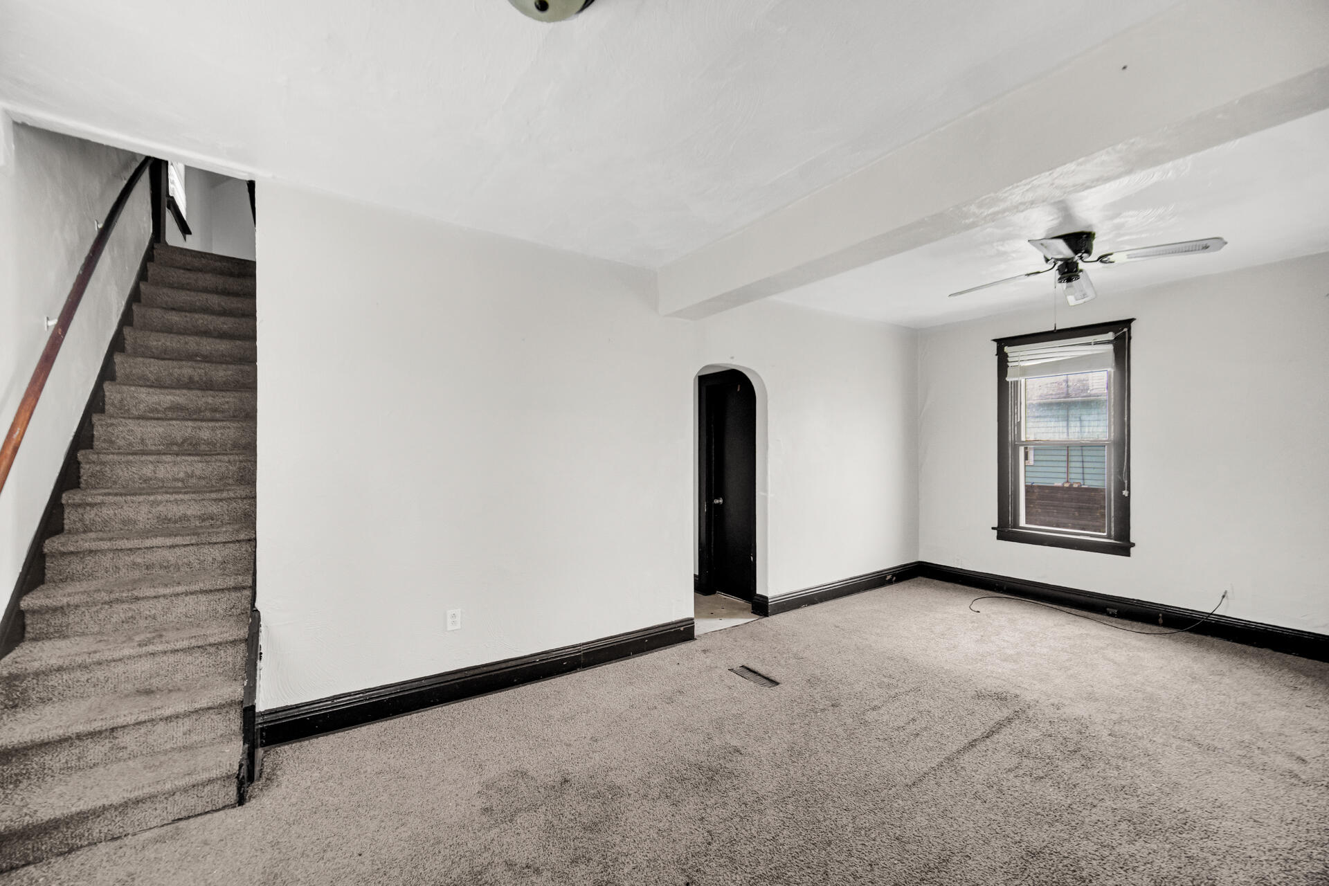1356 Johnson Street Gary, IN 46407 - Photo 4 of 12 a view of an empty room with windows
