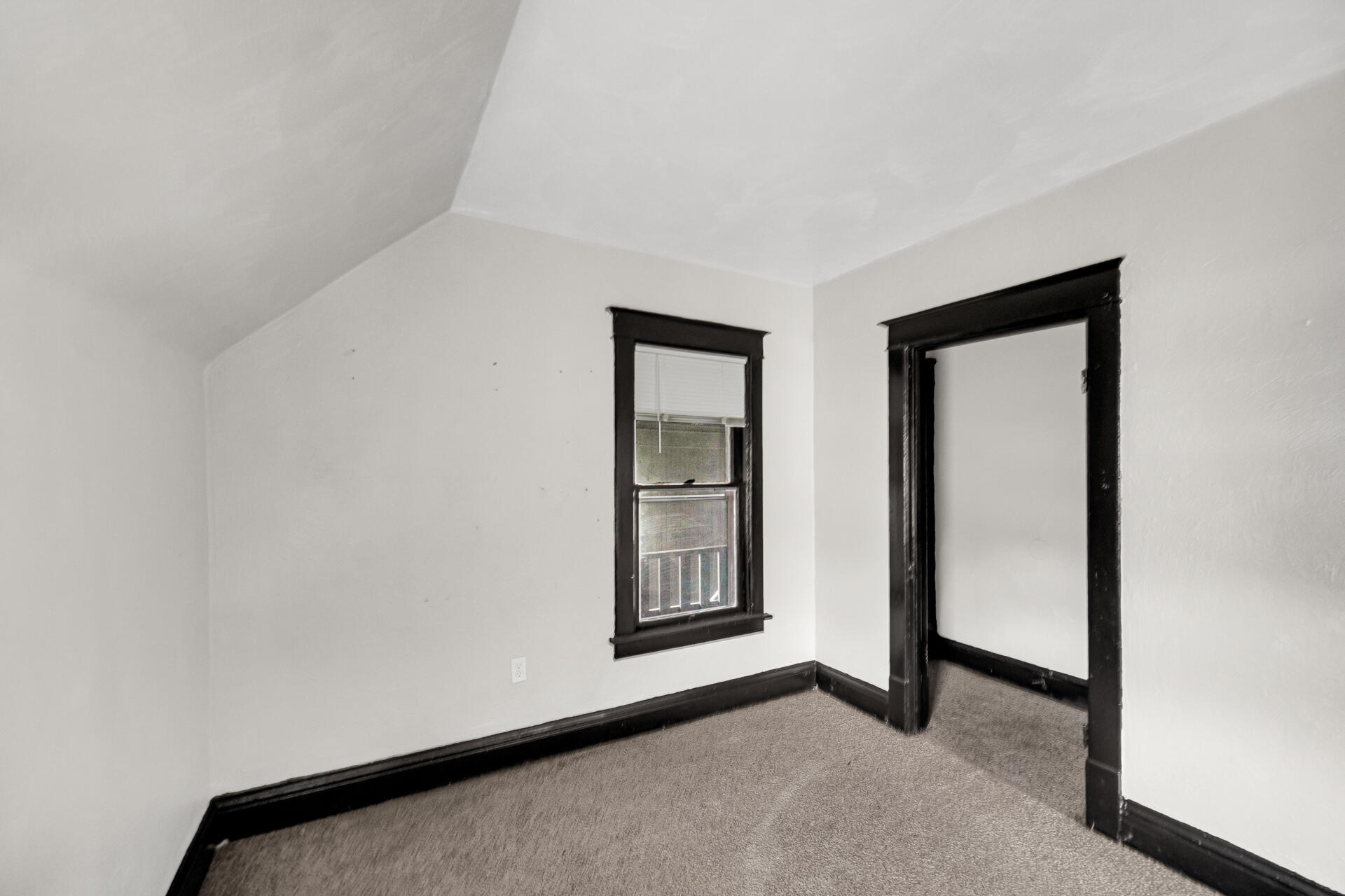 1356 Johnson Street Gary, IN 46407 - Photo 7 of 12 a view of an empty room and window