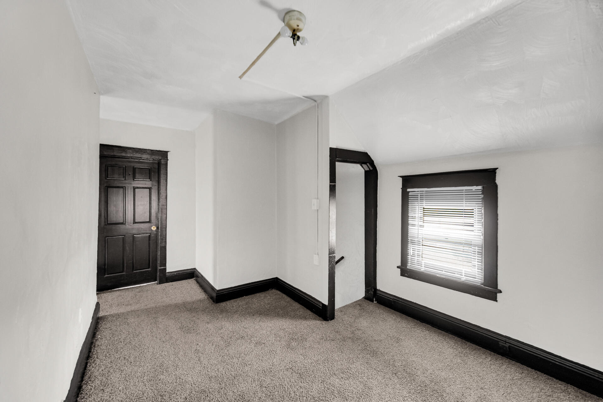 1356 Johnson Street Gary, IN 46407 - Photo 8 of 12 an empty room with windows