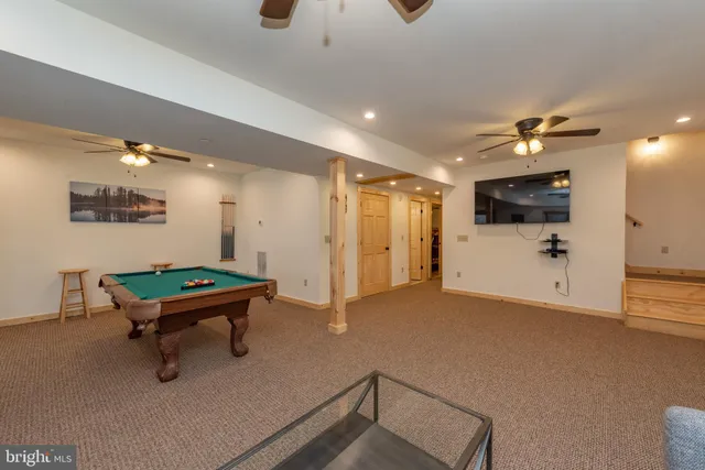 a bedroom with furniture and window