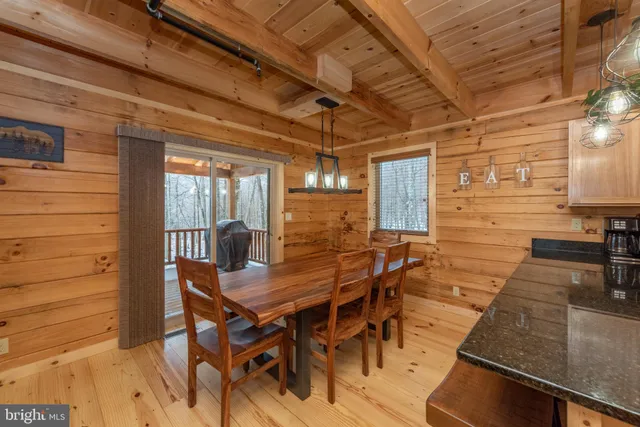 a view of a dining room with furniture