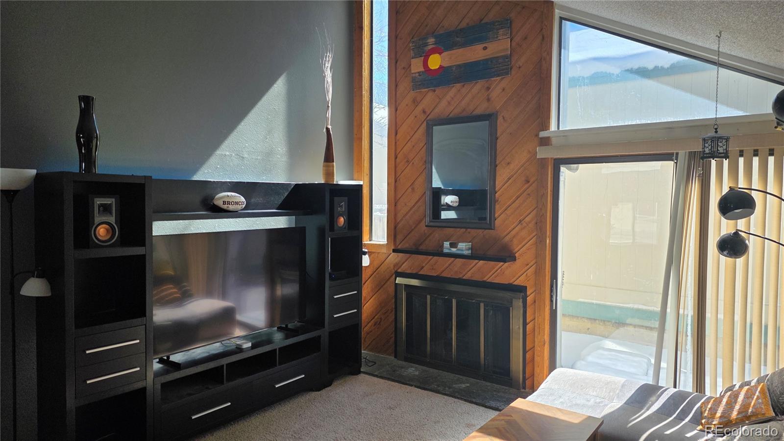 3771 South Danube Circle Aurora, CO 80013 - Photo 5 of 25 a kitchen with a refrigerator and a stove