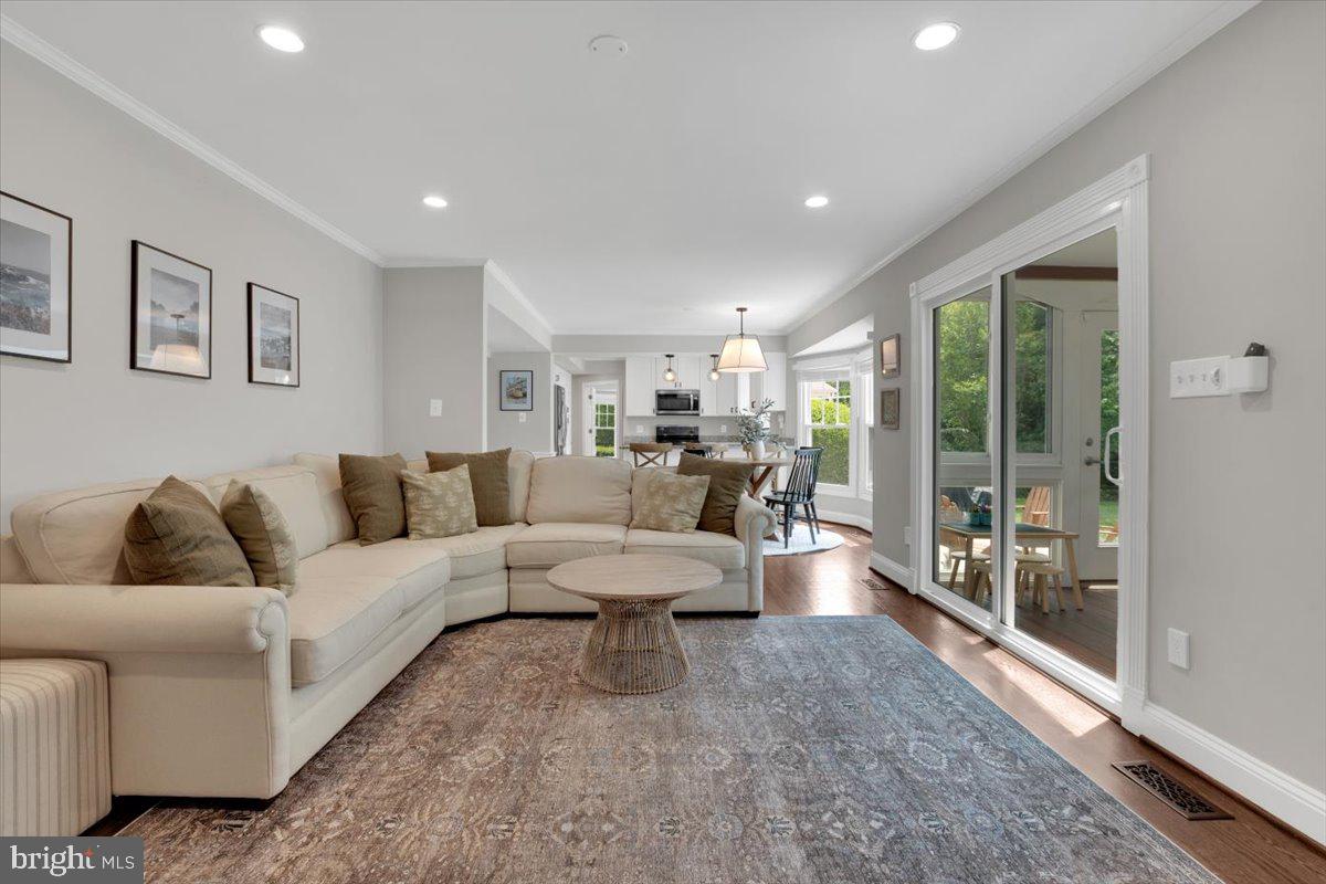 12649 Thunder Chase Drive Reston, VA 20191 - Photo 11 of 53 a living room with furniture and a large window