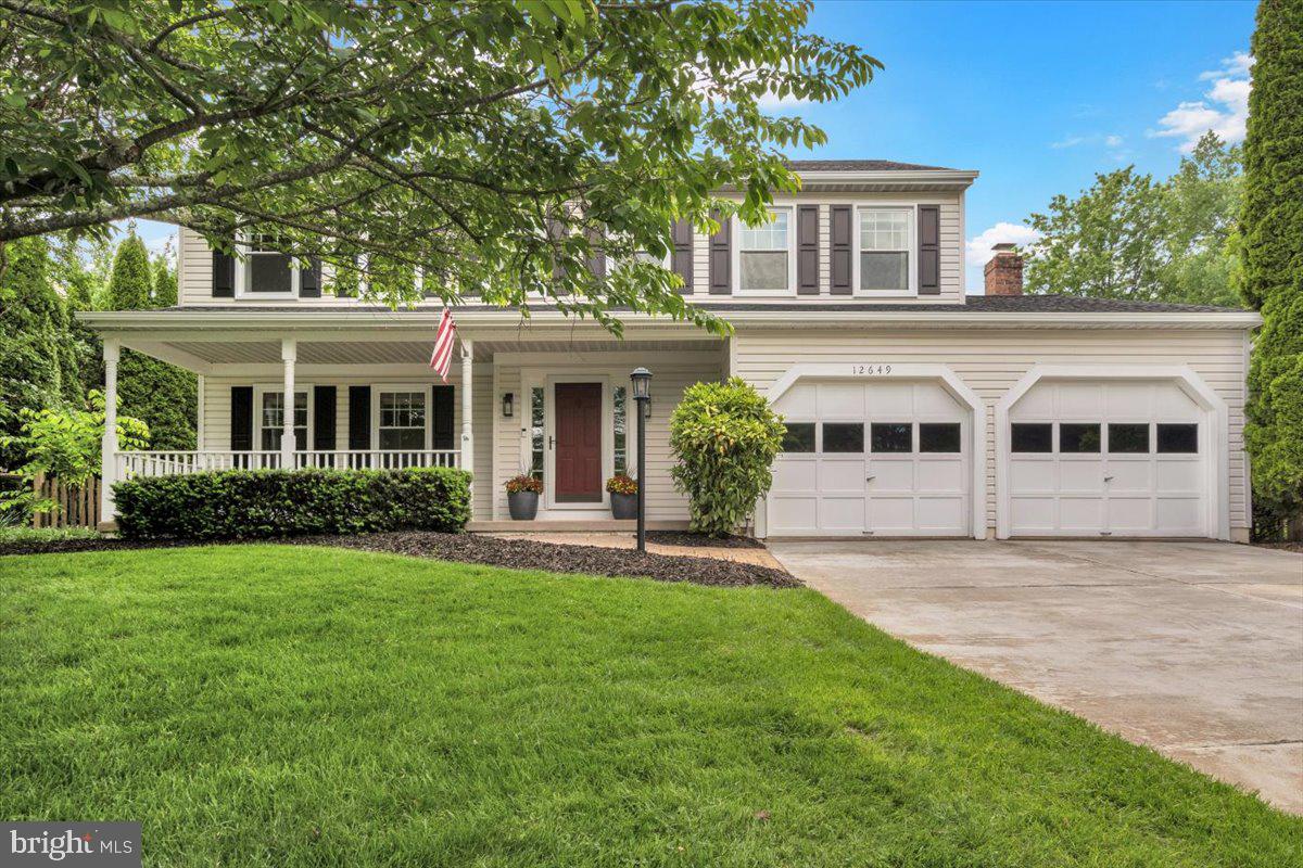 12649 Thunder Chase Drive Reston, VA 20191 - Photo 40 of 53 a front view of a house with a garden