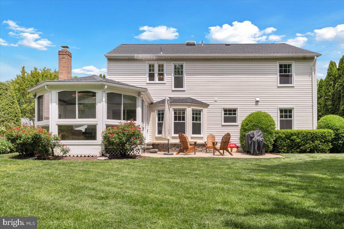 12649 Thunder Chase Drive Reston, VA 20191 - Photo 42 of 53 a front view of a house with a yard