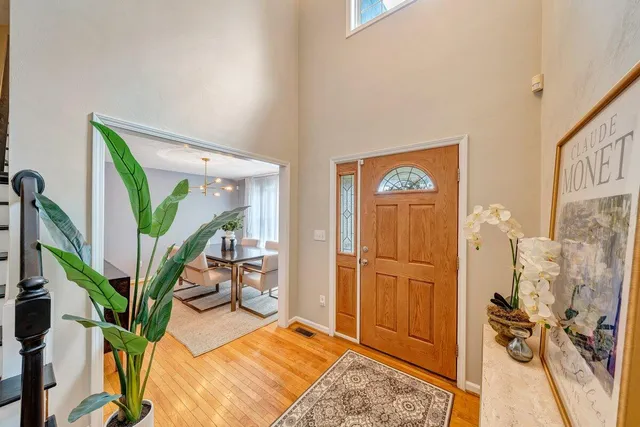 a bedroom with bed and window
