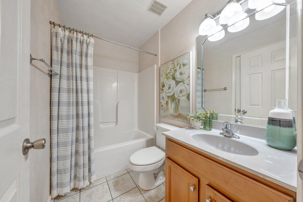 3770 Laurel Ridge Road Northwest Roanoke, VA 24019 - Photo 33 of 55 a bathroom with a sink a toilet and shower