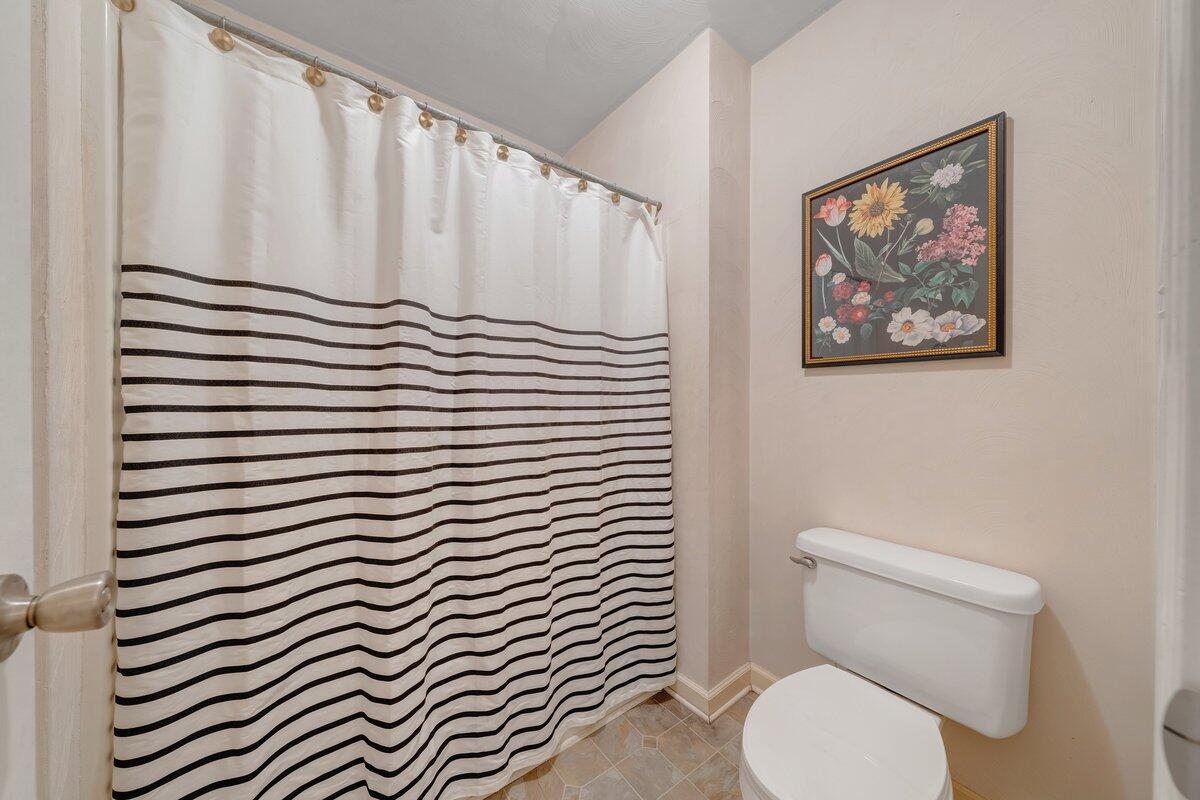 3770 Laurel Ridge Road Northwest Roanoke, VA 24019 - Photo 36 of 55 a white toilet sitting next to a white cabinet