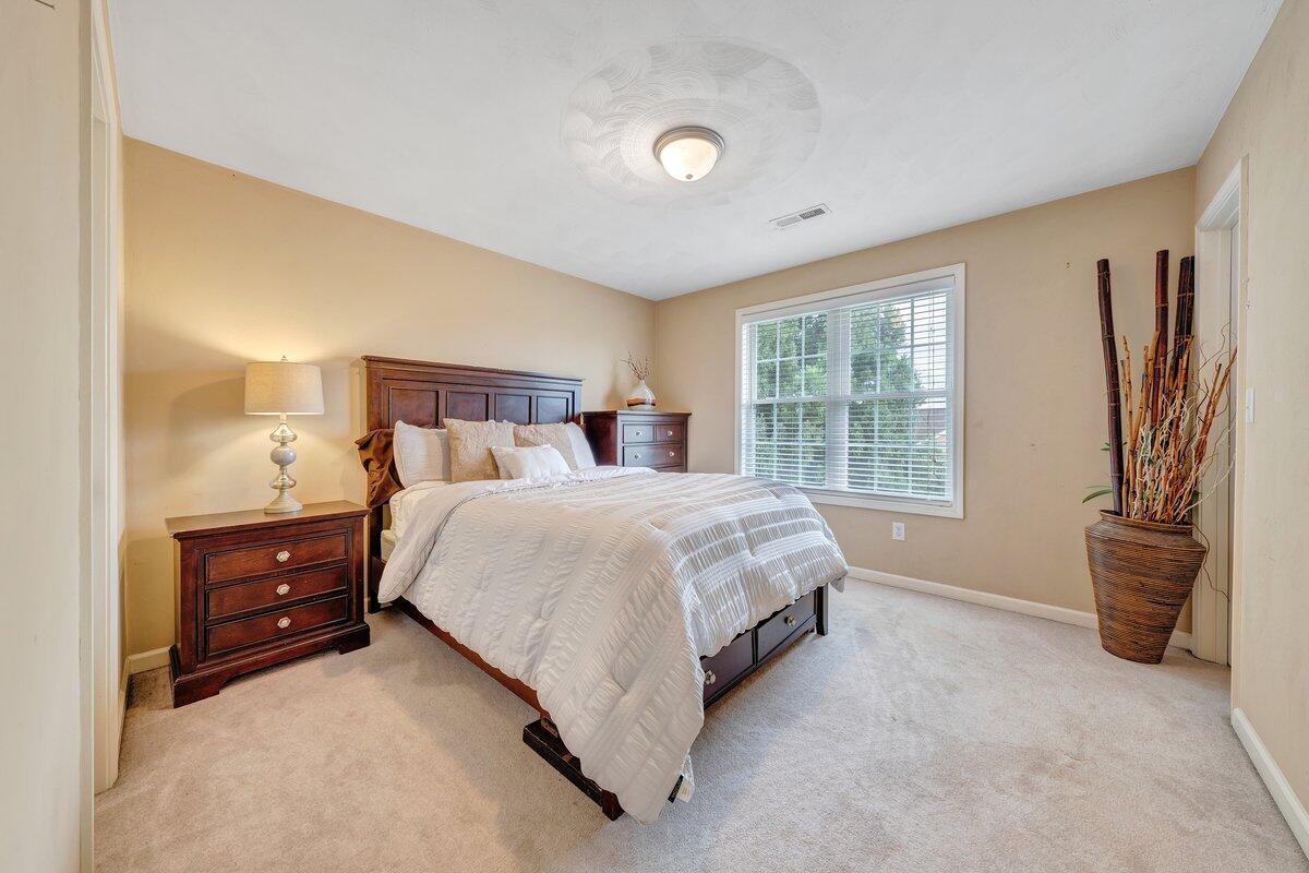 3770 Laurel Ridge Road Northwest Roanoke, VA 24019 - Photo 37 of 55 a spacious bedroom with a bed and a window