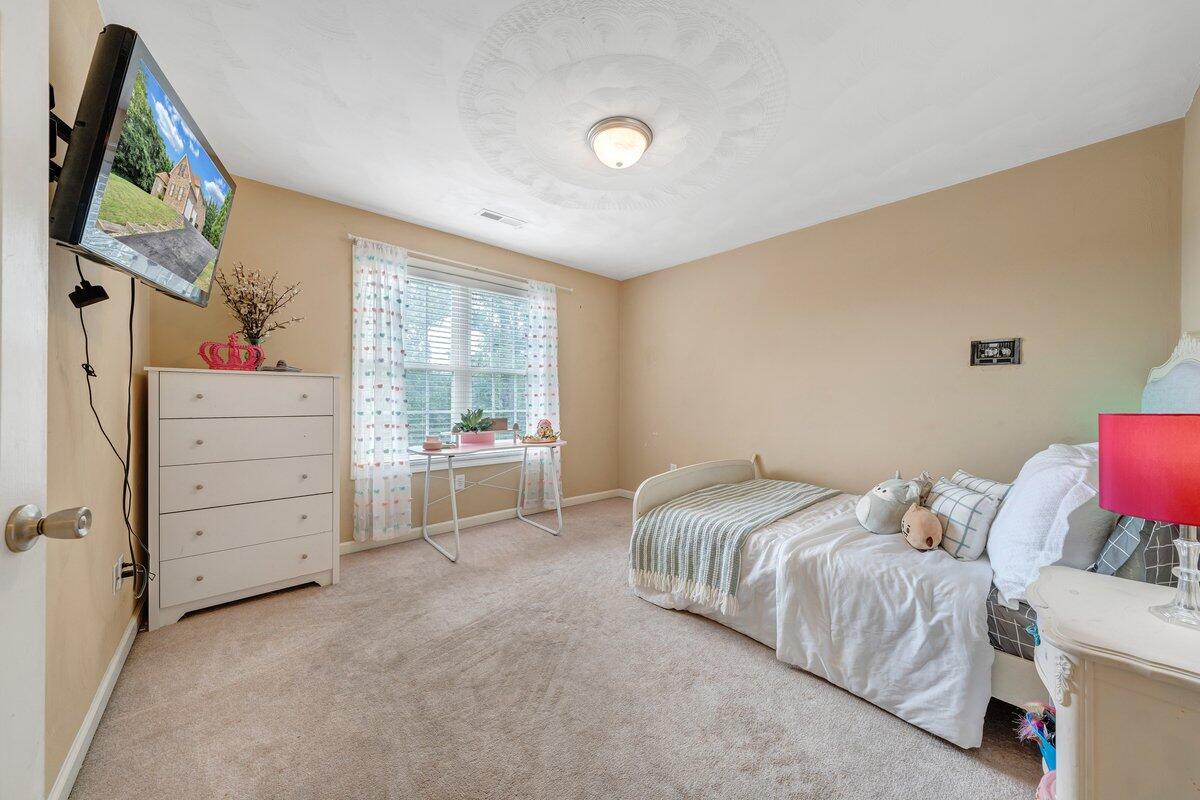 3770 Laurel Ridge Road Northwest Roanoke, VA 24019 - Photo 38 of 55 a bedroom with a bed and a window