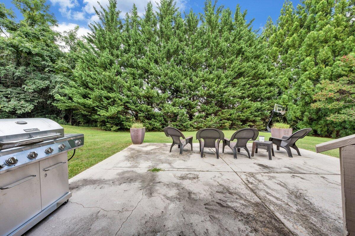 3770 Laurel Ridge Road Northwest Roanoke, VA 24019 - Photo 46 of 55 a view of a patio with table and chairs and potted plants