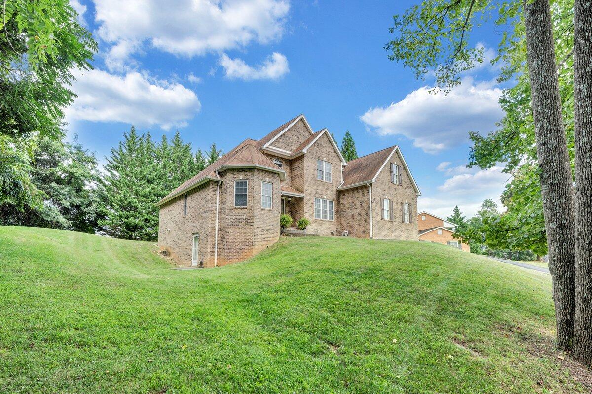 3770 Laurel Ridge Road Northwest Roanoke, VA 24019 - Photo 50 of 55 a view of a big house with a big yard and large trees