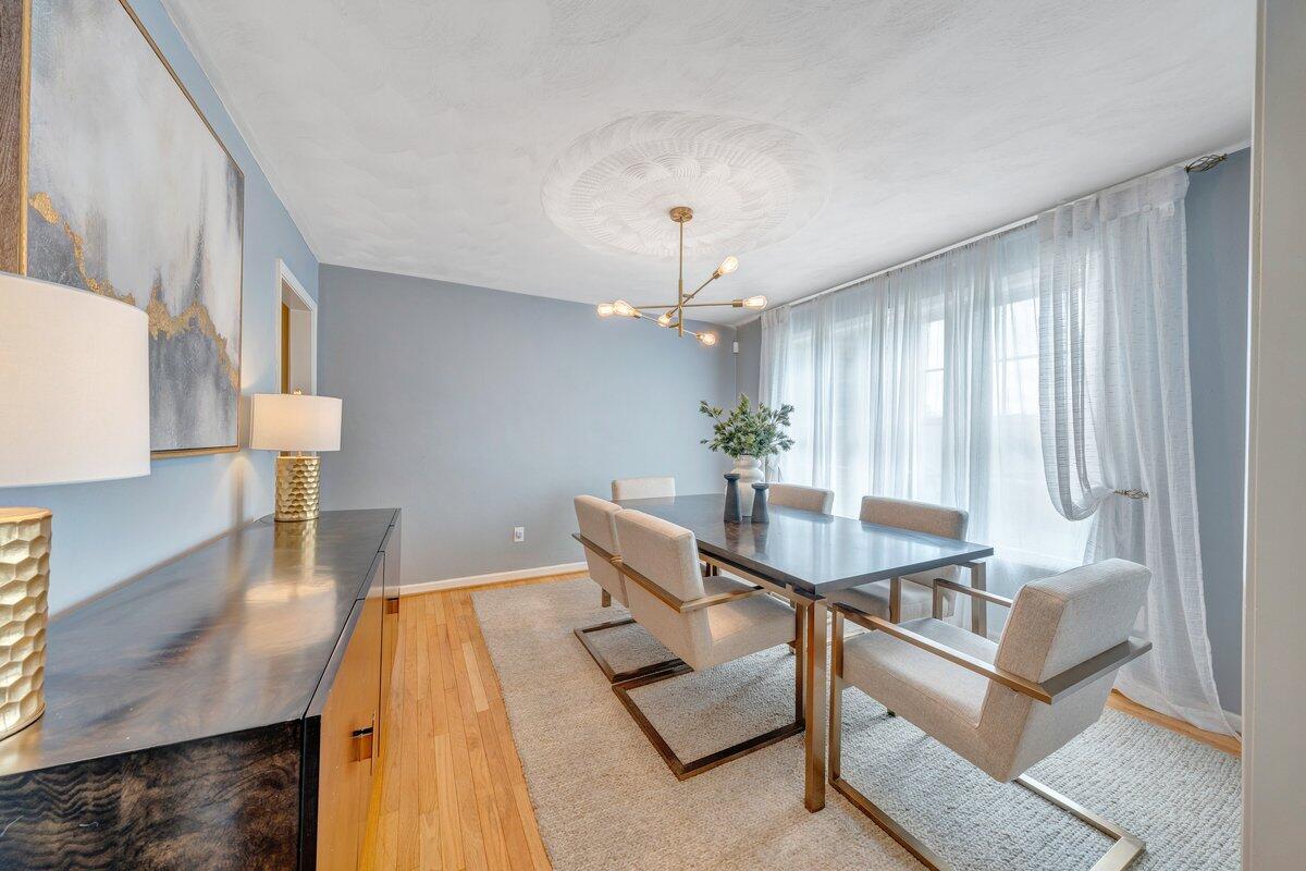 3770 Laurel Ridge Road Northwest Roanoke, VA 24019 - Photo 8 of 55 a dining room with furniture and wooden floor