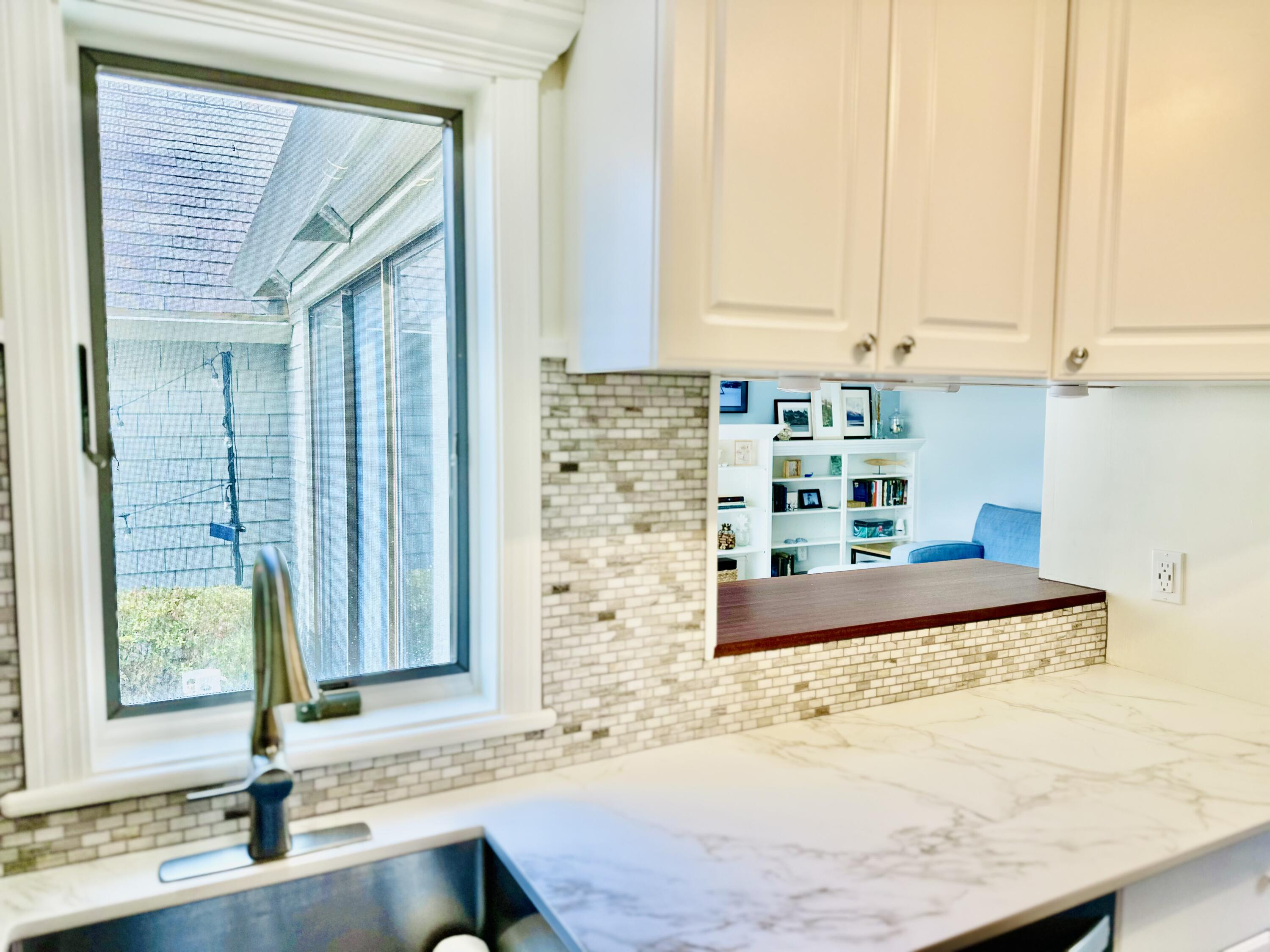 22 Mid-Iron Way, Unit 7517 Mashpee, MA 02649 - Photo 17 of 47 a bathroom with a granite countertop sink and a mirror