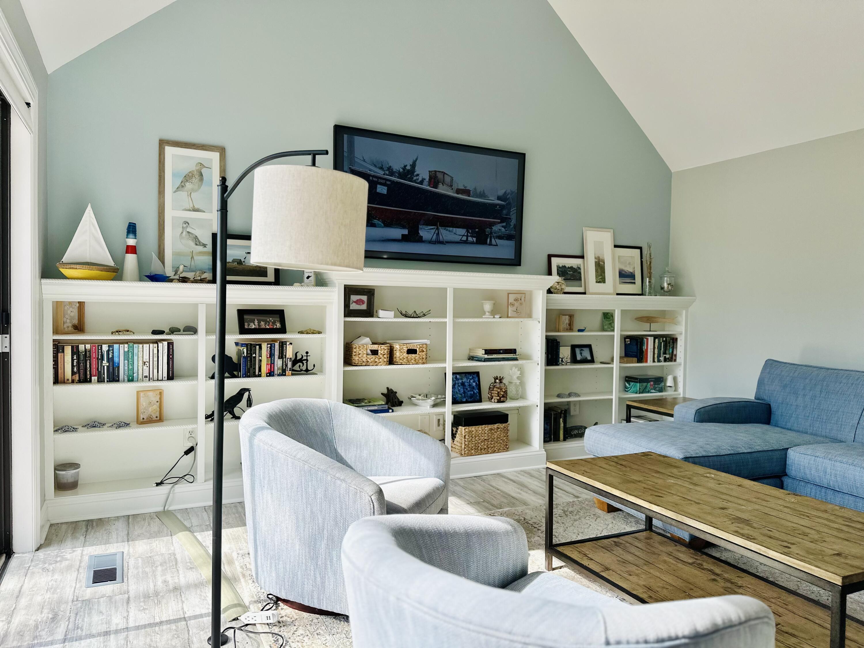 22 Mid-Iron Way, Unit 7517 Mashpee, MA 02649 - Photo 19 of 47 a living room with furniture and a flat screen tv