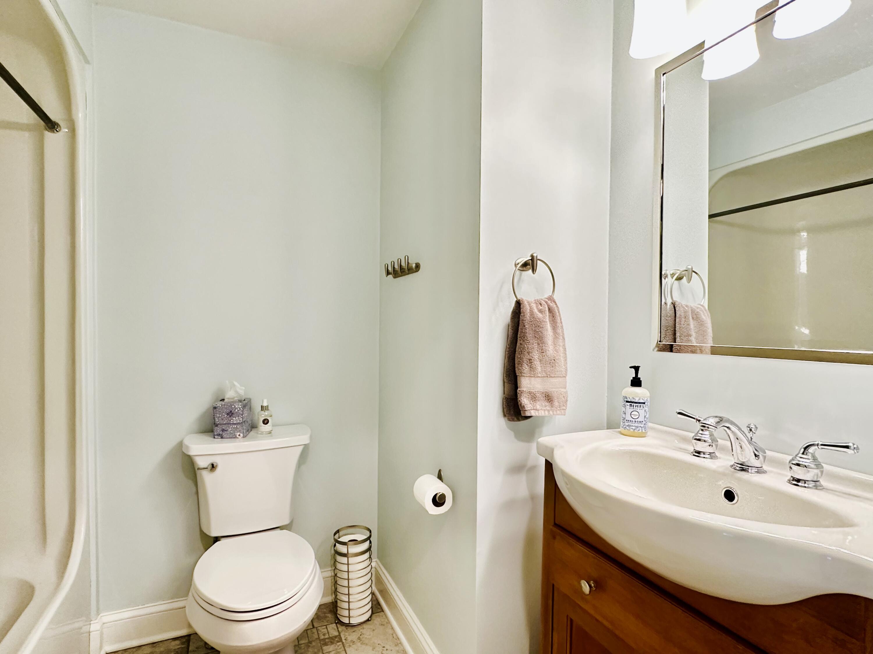 22 Mid-Iron Way, Unit 7517 Mashpee, MA 02649 - Photo 22 of 47 a bathroom with a sink toilet and mirror
