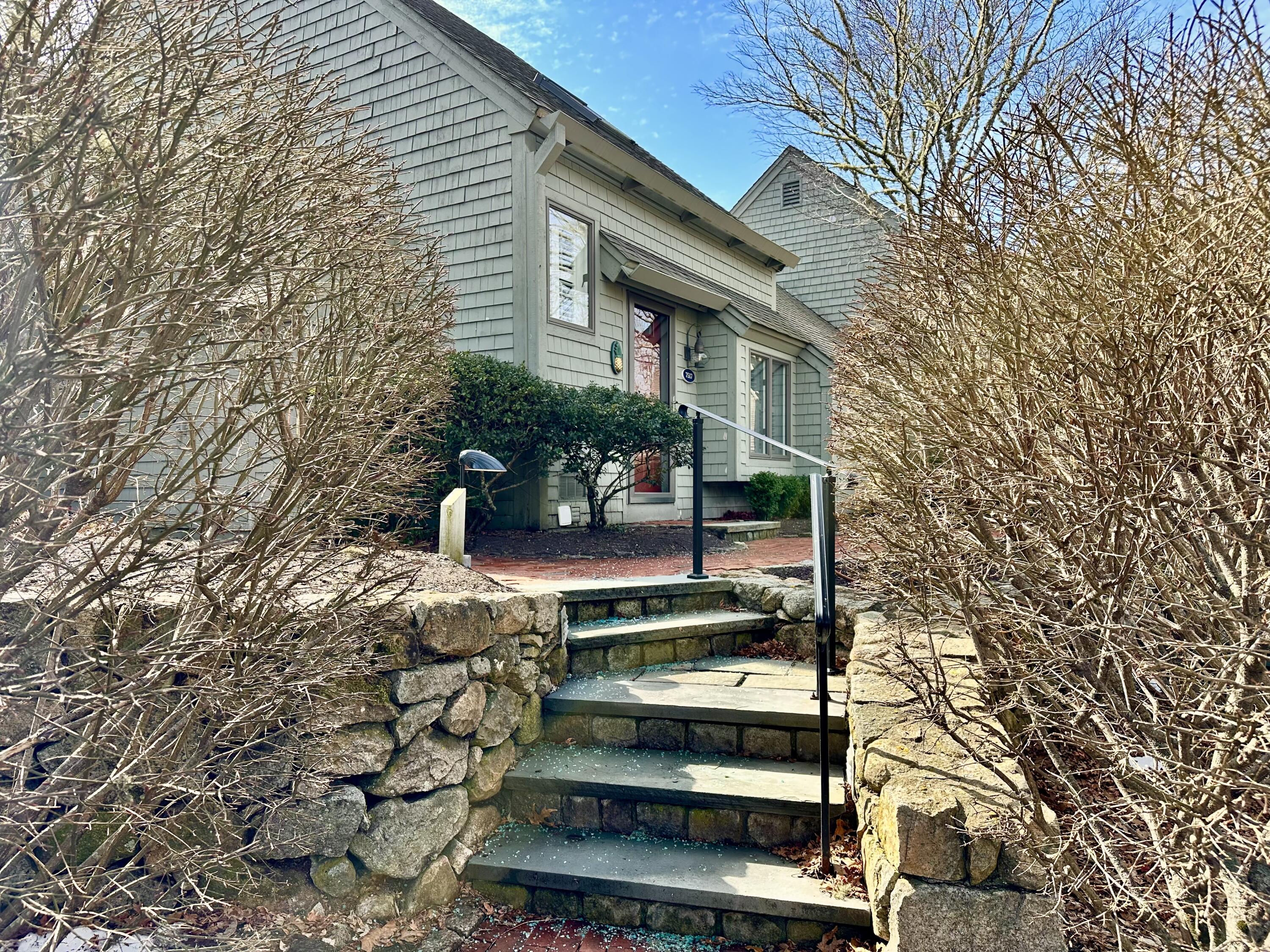 22 Mid-Iron Way, Unit 7517 Mashpee, MA 02649 - Photo 3 of 47 a view of a house with backyard