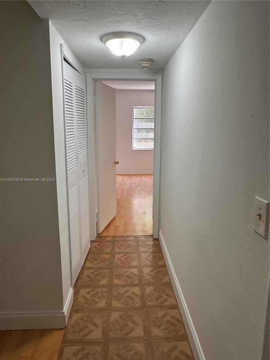 15888 Southwest 95th Avenue, Unit 201 Miami, FL 33157 - Photo 20 of 27 a view of a hallway