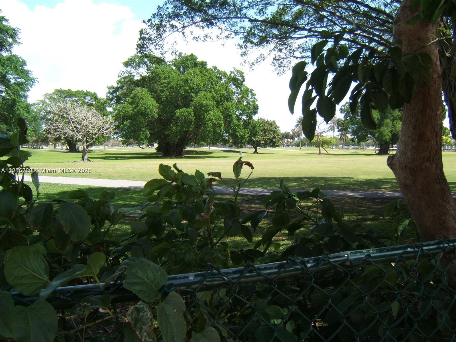 15888 Southwest 95th Avenue, Unit 201 Miami, FL 33157 - Photo 24 of 27 a view of an outdoor space and a lake view