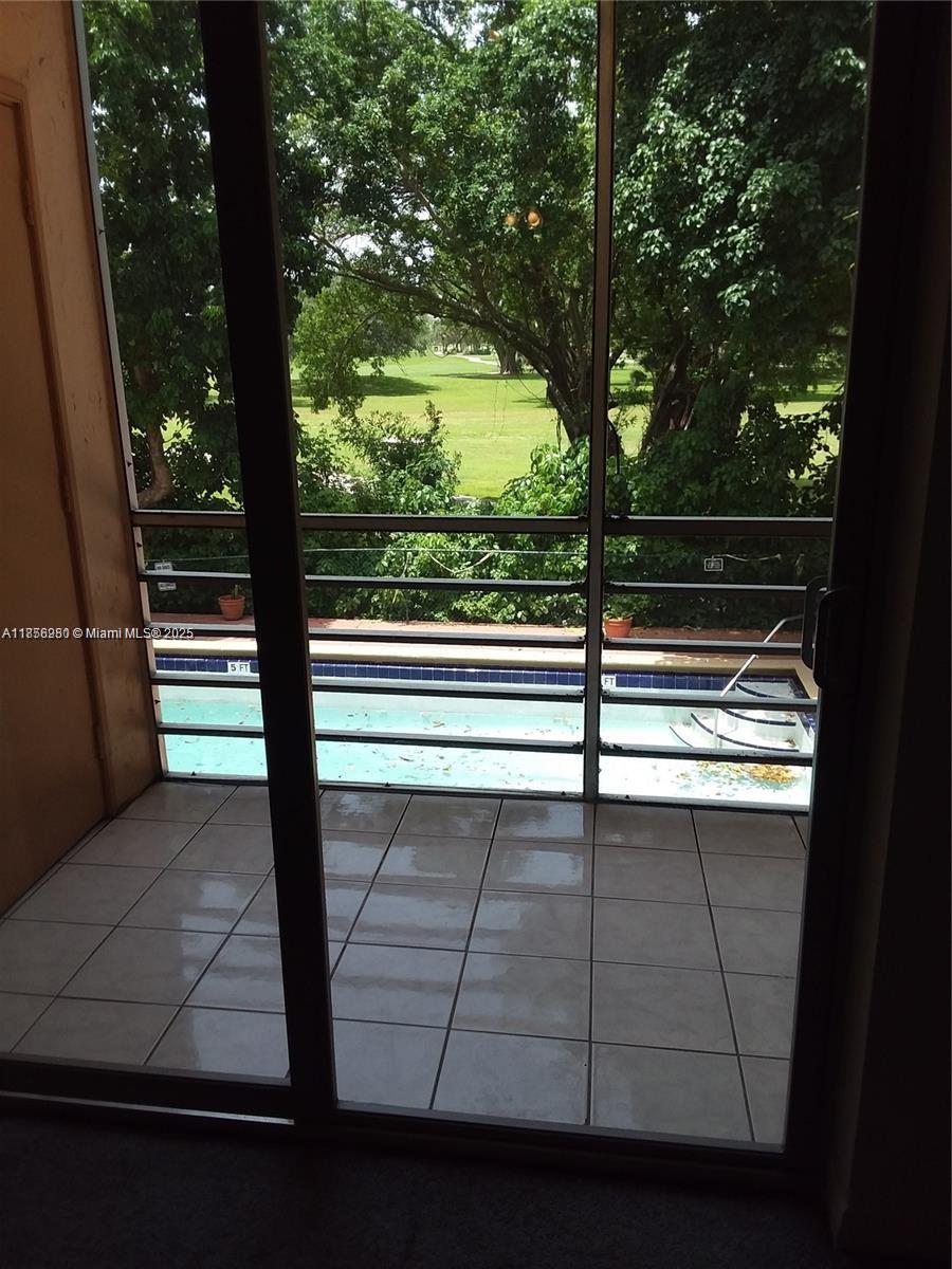 15888 Southwest 95th Avenue, Unit 201 Miami, FL 33157 - Photo 26 of 27 a view of outdoor space