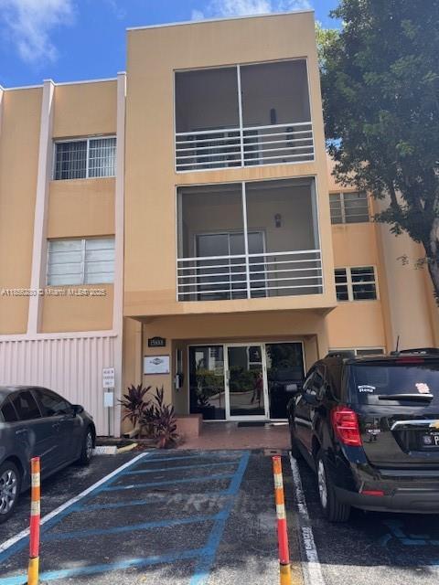 15888 Southwest 95th Avenue, Unit 201 Miami, FL 33157 - Photo 3 of 27 a view of a house with a patio