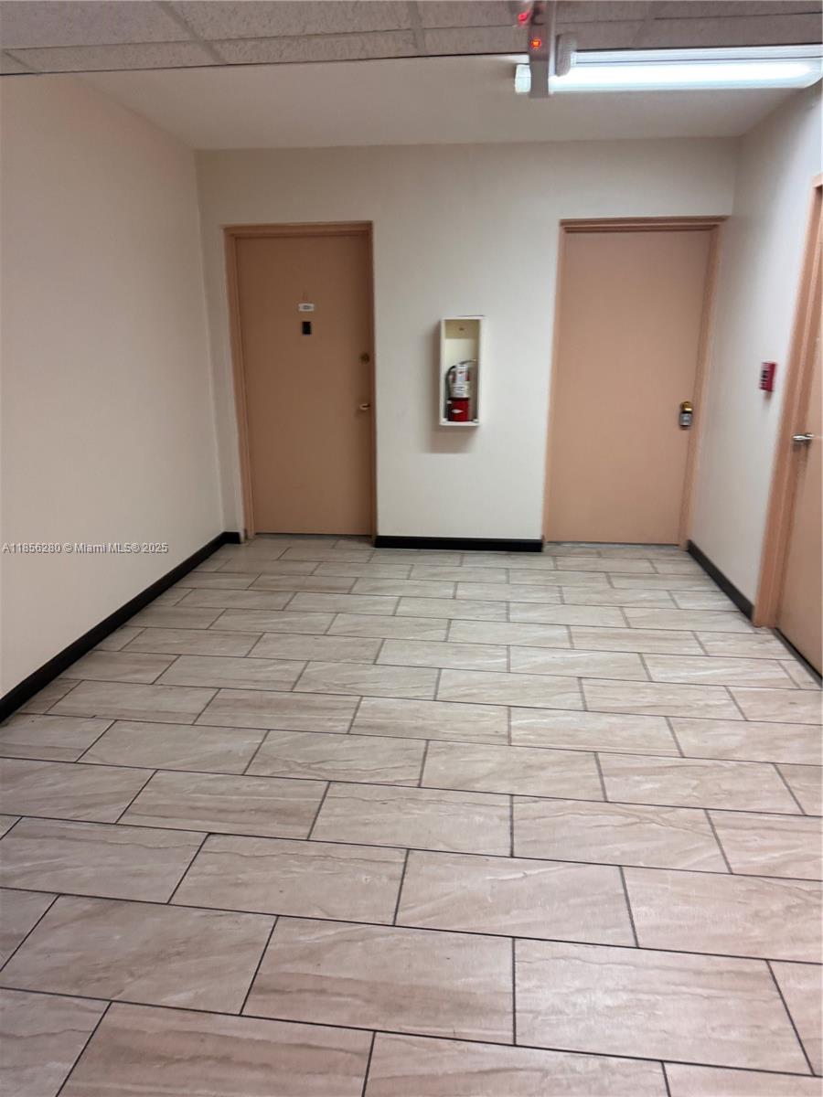 15888 Southwest 95th Avenue, Unit 201 Miami, FL 33157 - Photo 9 of 27 a view of a room with white walls