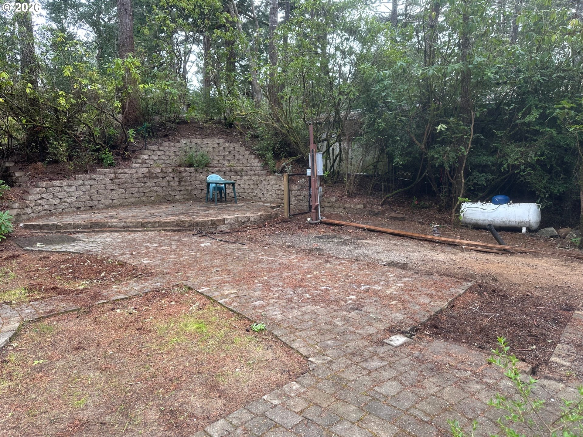 71 Castaway Cove Florence, OR 97439 - Photo 13 of 15 a view of a backyard with furniture