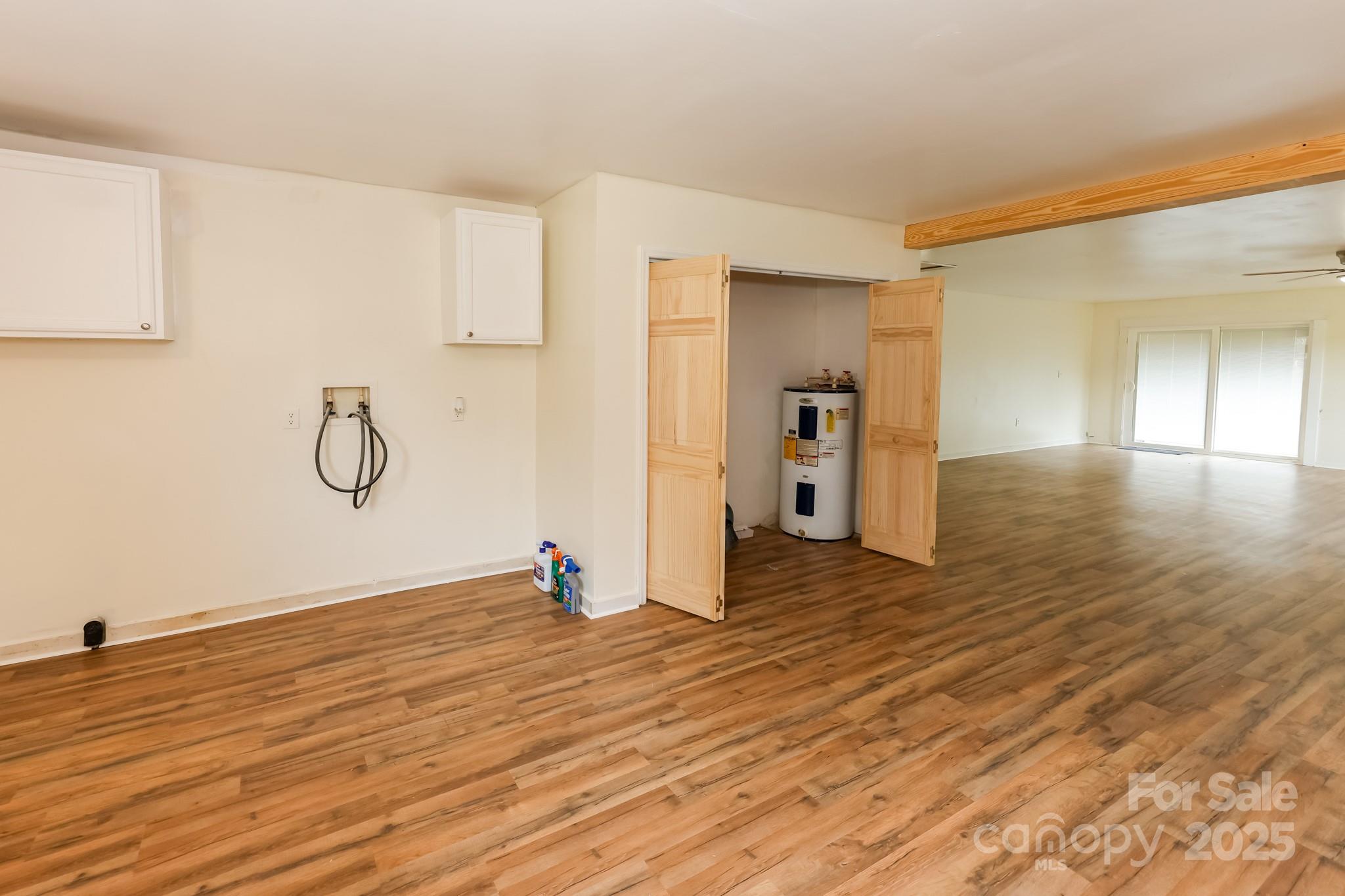 344 Piedmont Road Rutherfordton, NC 28139 - Photo 21 of 25 a view of empty room with wooden floor and cabinet