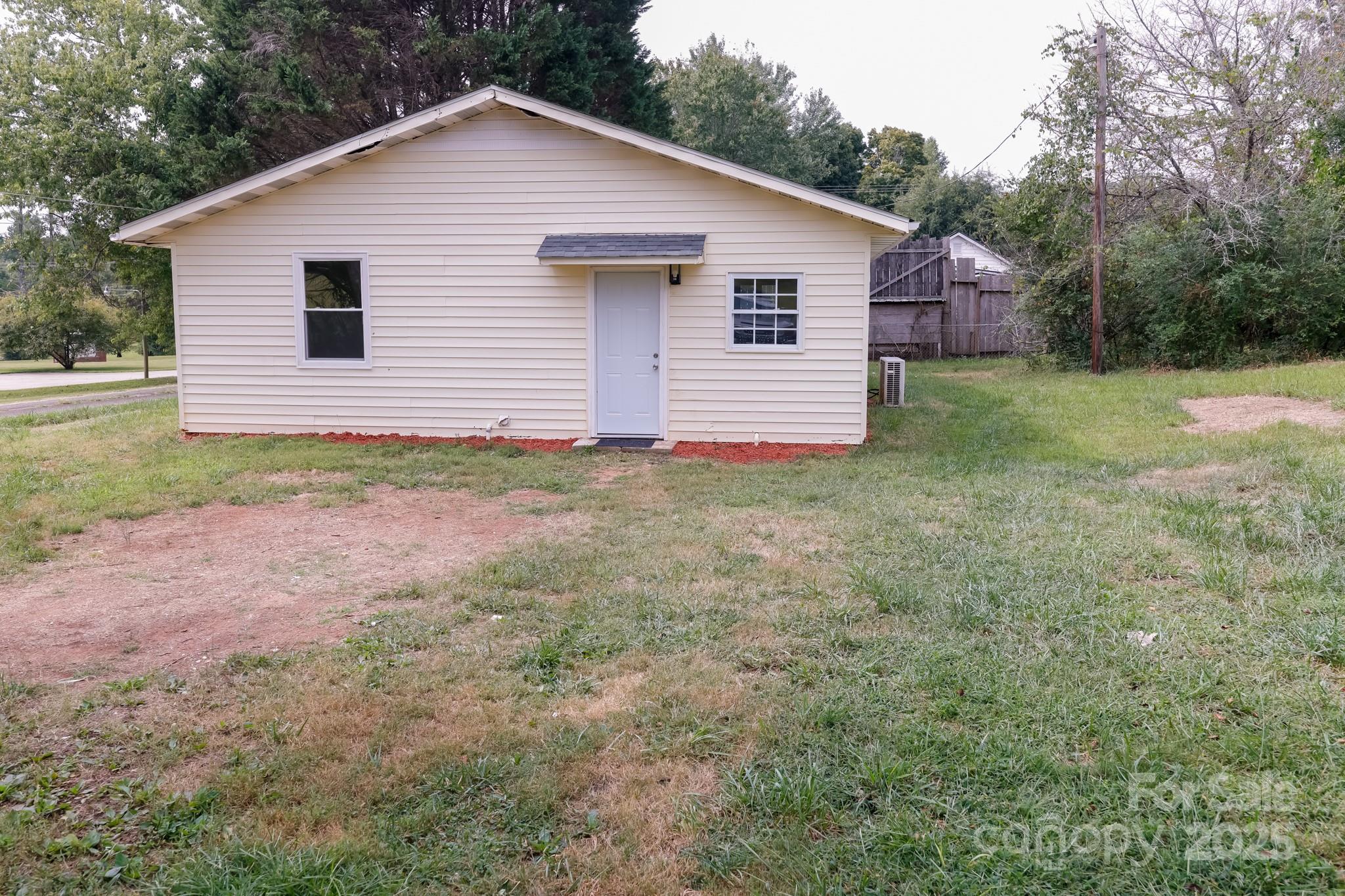 344 Piedmont Road Rutherfordton, NC 28139 - Photo 24 of 25 a view of a house with yard and a garden