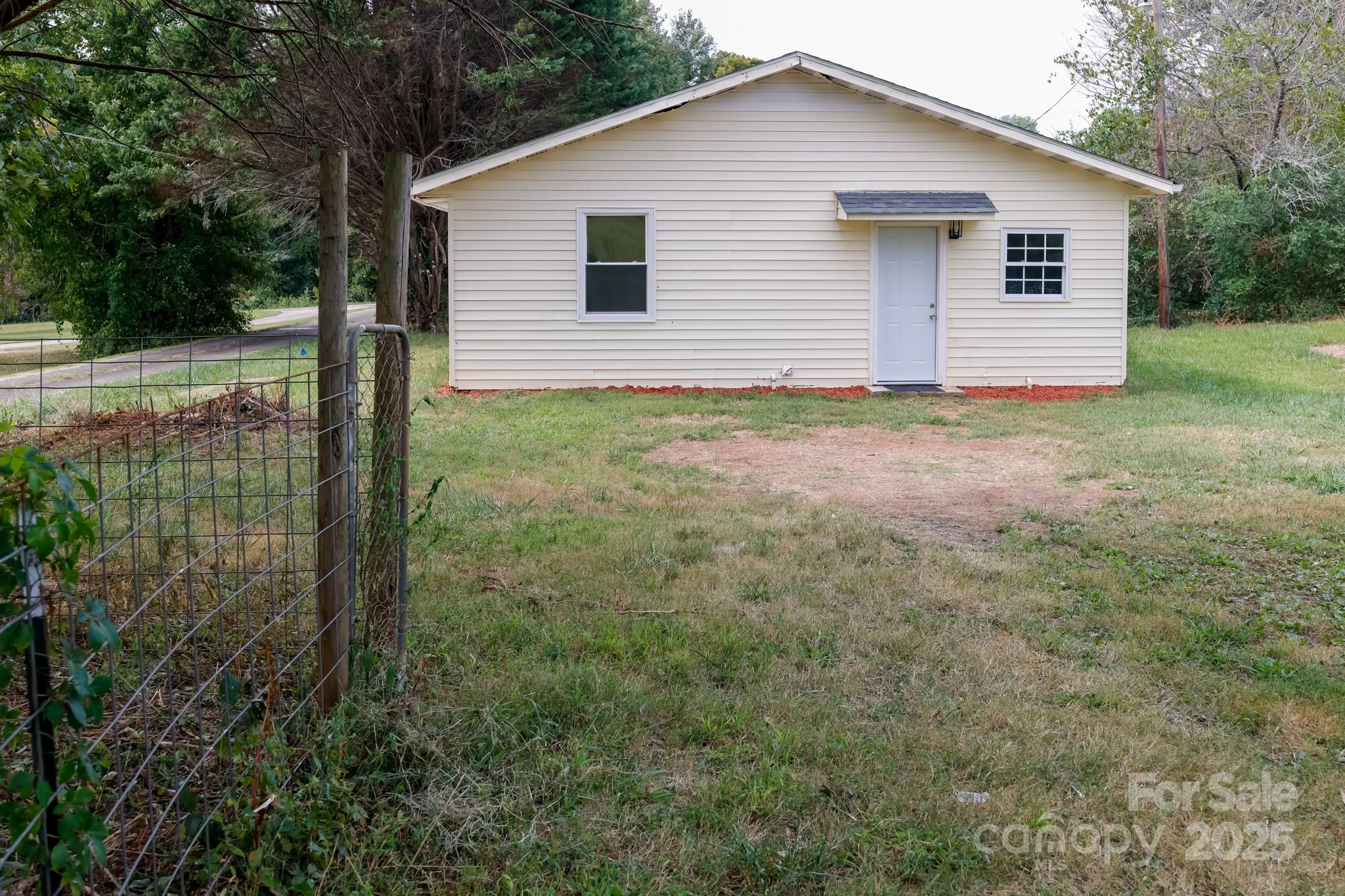 344 Piedmont Road Rutherfordton, NC 28139 - Photo 25 of 25 a view of backyard of house and wooden fence