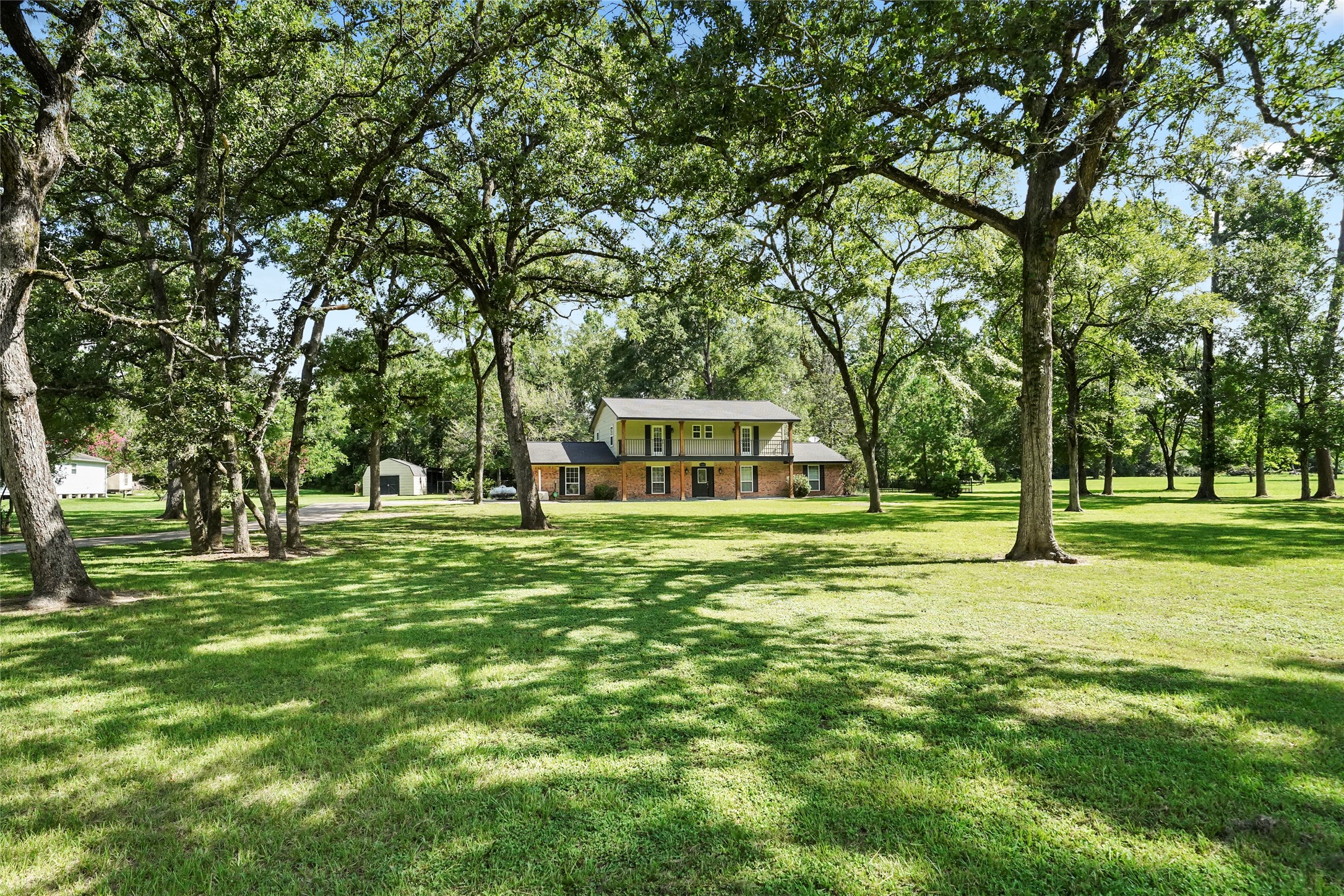 14443 Lyric Road Conroe, TX 77302 - Photo 4 of 49 Beautifully set back home with large second floor terrace
