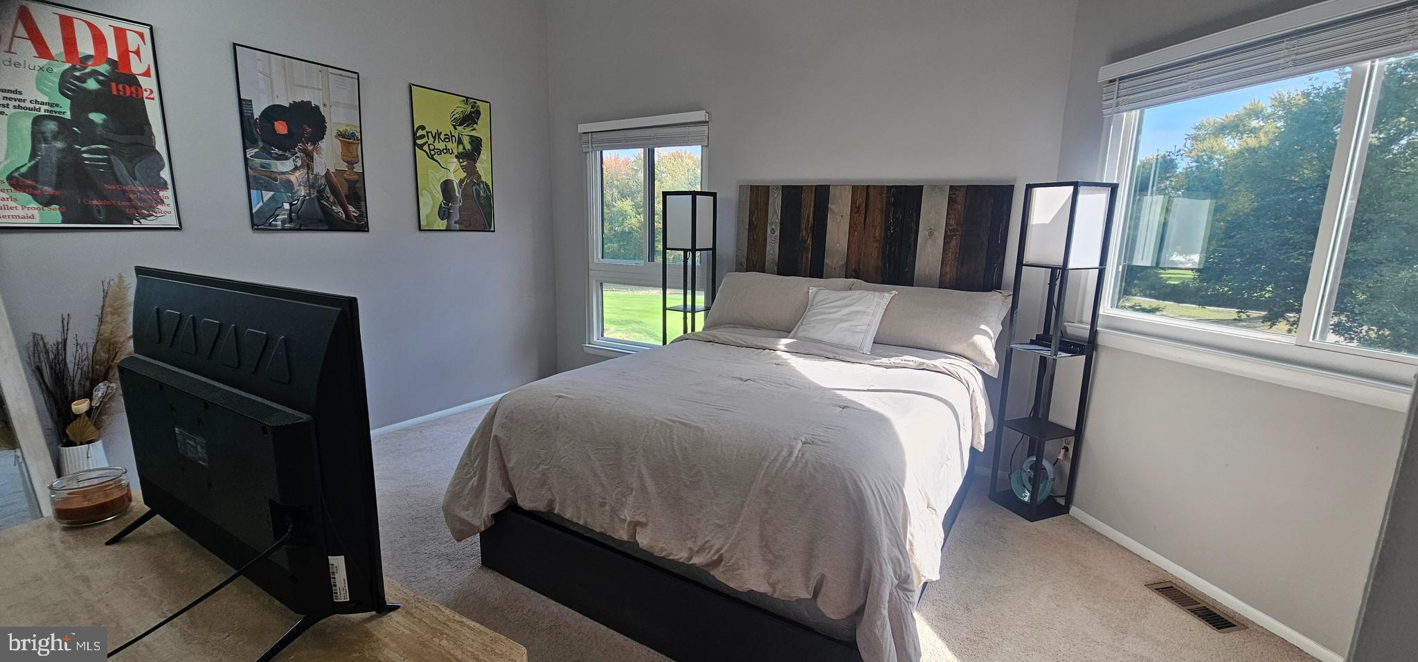 605 Augusta Circle Mount Laurel, NJ 08054 - Photo 11 of 28 a bed sitting in a bedroom next to a window