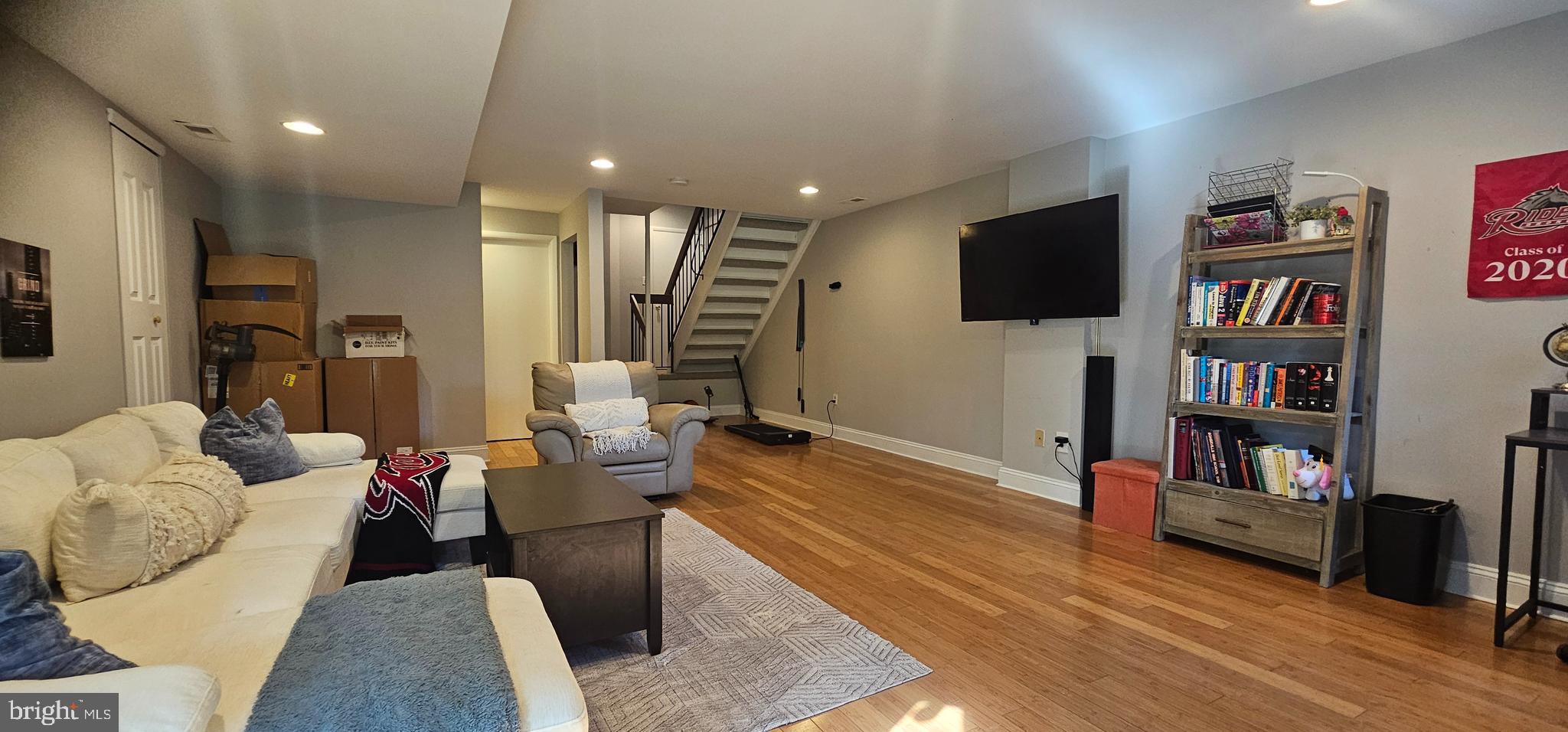 605 Augusta Circle Mount Laurel, NJ 08054 - Photo 13 of 28 a living room with furniture and a flat screen tv