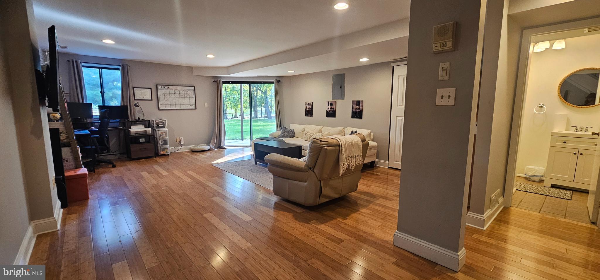 605 Augusta Circle Mount Laurel, NJ 08054 - Photo 2 of 28 a living room with furniture and a wooden floor