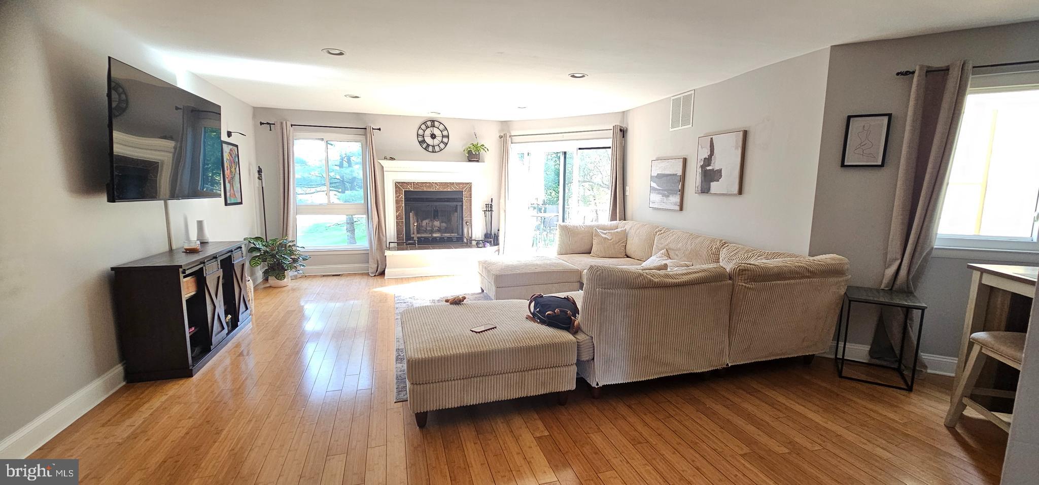 605 Augusta Circle Mount Laurel, NJ 08054 - Photo 3 of 28 a living room with furniture and a flat screen tv