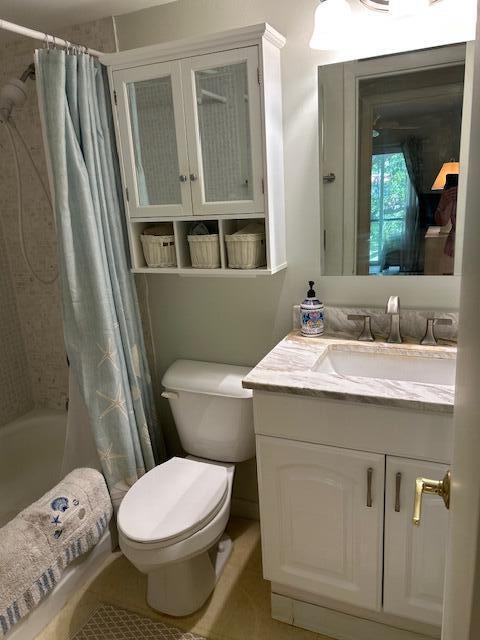 1955 Southwest Palm City Road, Unit H Stuart, FL 34994 - Photo 14 of 22 a bathroom with a sink and a mirror