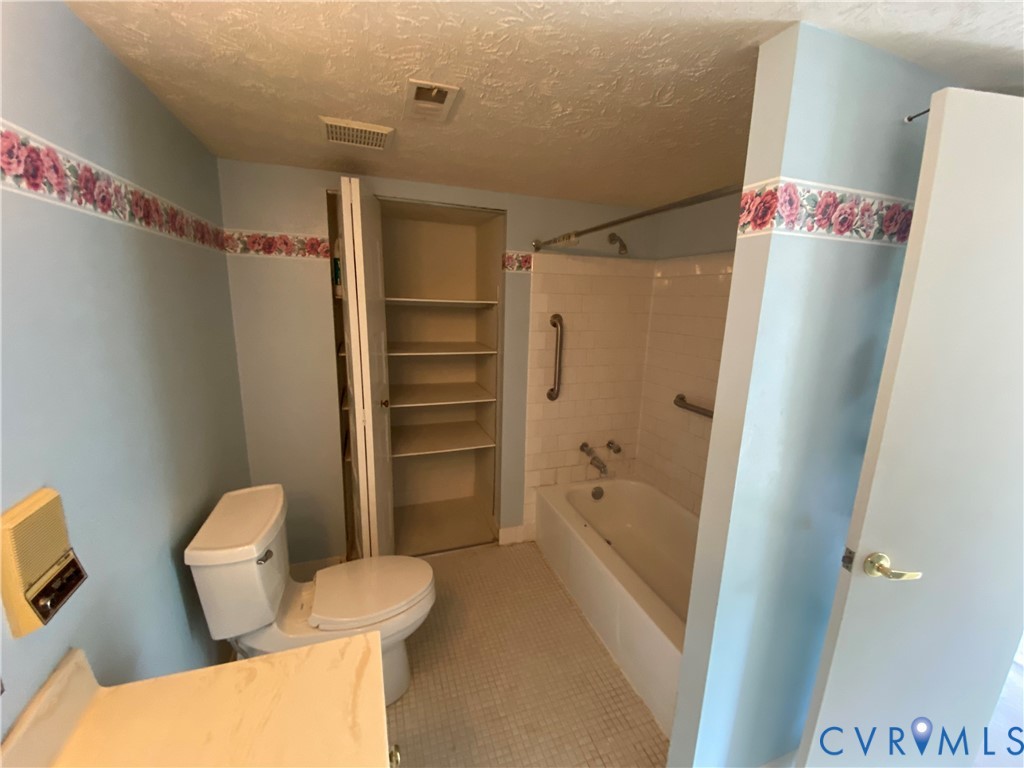 1507 Bronwyn Road, Unit 301 Henrico, VA 23238 - Photo 26 of 41 a bathroom with a shower and a toilet