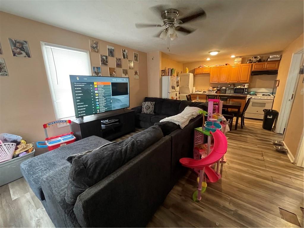70 South Street Fredericktown, PA 15333 - Photo 4 of 24 a living room with furniture and a flat screen tv