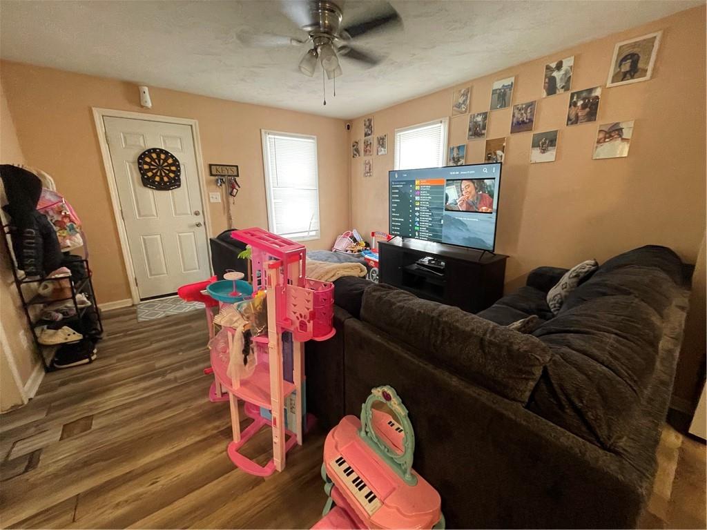 70 South Street Fredericktown, PA 15333 - Photo 5 of 24 a living room with furniture and a flat screen tv