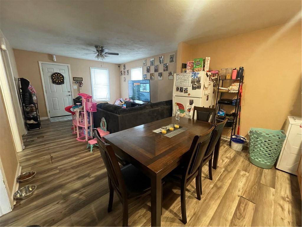 70 South Street Fredericktown, PA 15333 - Photo 8 of 24 a view of a dining room with furniture and wooden floor