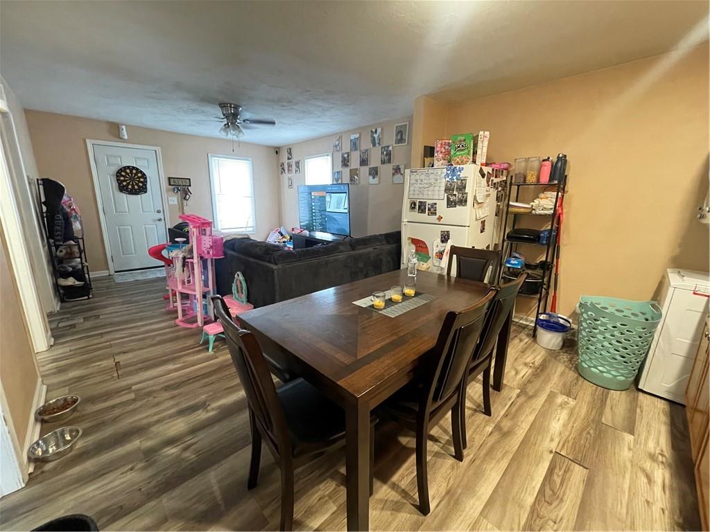70 South Street Fredericktown, PA 15333 - Photo 9 of 24 a view of a dining room with furniture and wooden floor