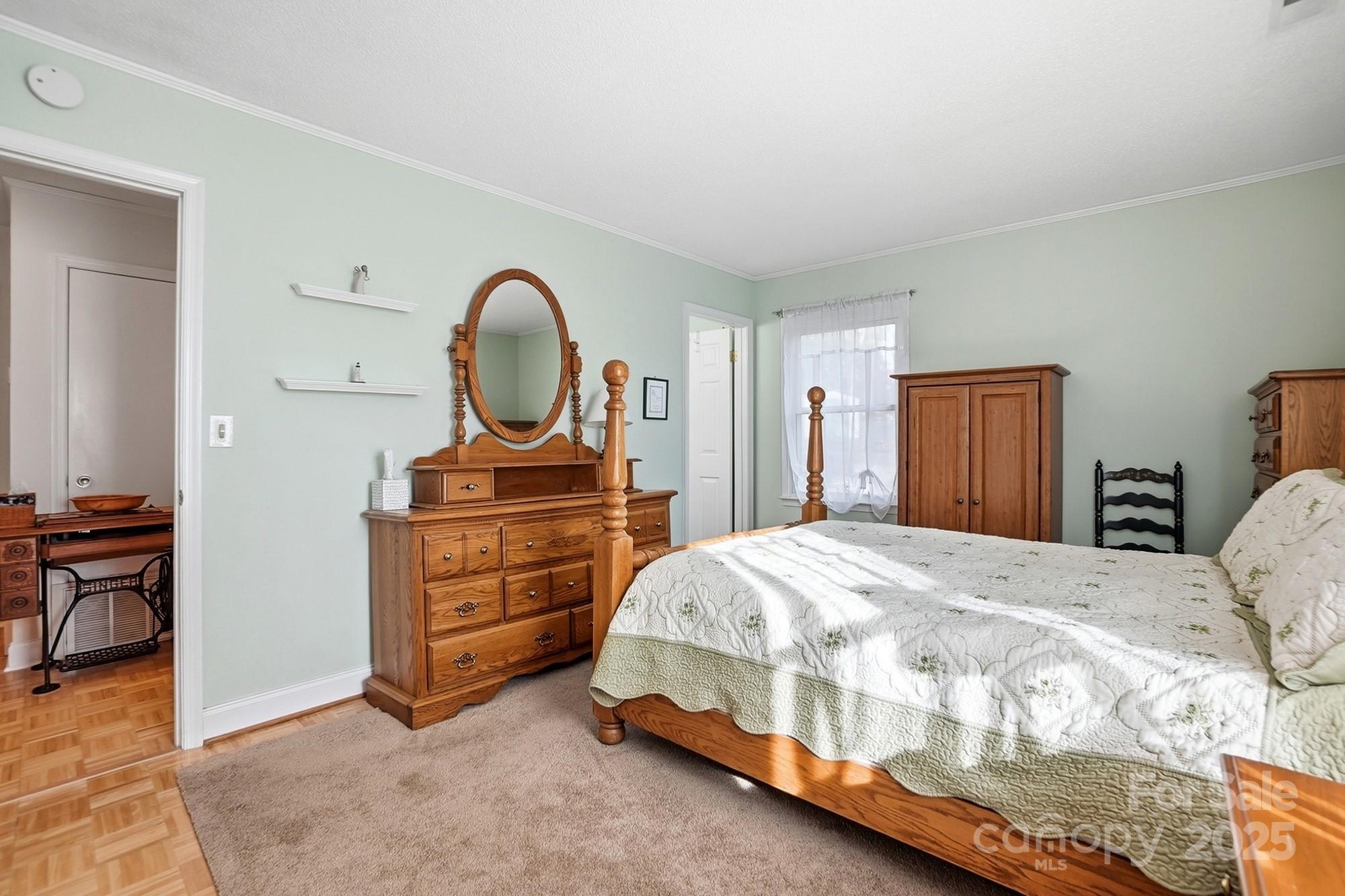 6309 Pineburr Road Charlotte, NC 28211 - Photo 11 of 46 a bedroom with a bed and a dresser