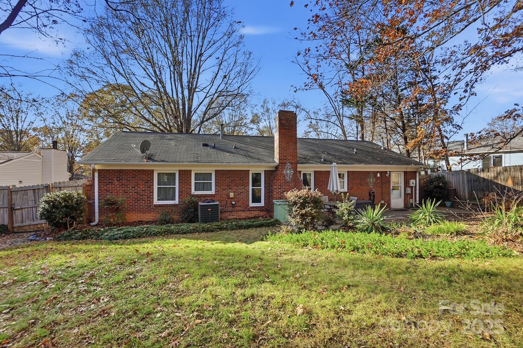 6309 Pineburr Road Charlotte, NC 28211 - Photo 2 of 46 a front view of a house with garden